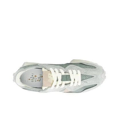 Low-top sneaker interior view with white laces and patterned insole