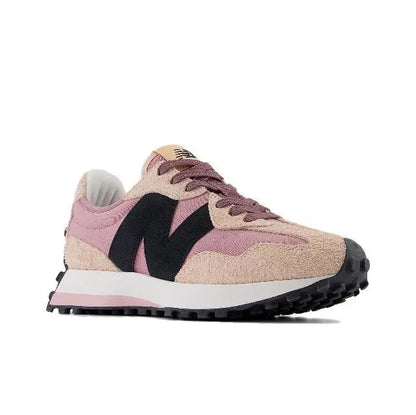 Sneaker front 3/4 view in rose and tan with black N logo and textured sole