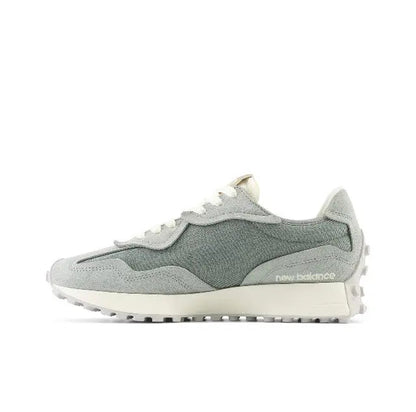 New Balance MS327 sneakers with green upper and light grey overlays, lace-up.
