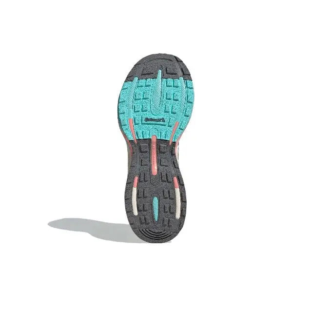 Adidas MTS Pro outsole, black tread with teal and pink traction areas
