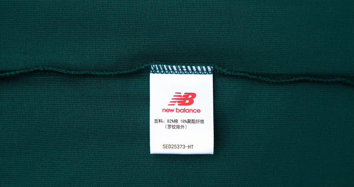 New Balance NBSC T-shirt label tag at collar seam