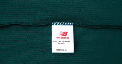 New Balance NBSC T-shirt label tag at collar seam