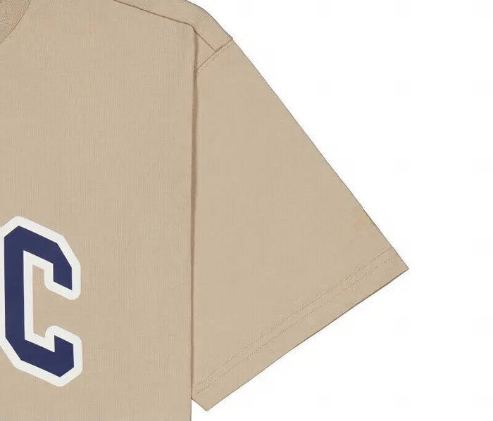 New Balance NBSC T-shirt sleeve detail, tan fabric side view