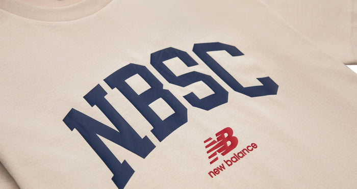 Cream crew-neck T-shirt with large NBSC logo