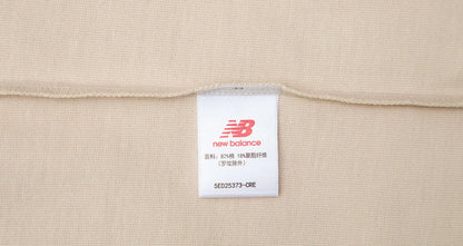 Cream T-shirt with neck/size tag detail