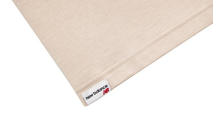 Cream T-shirt hem with 'new balance' tag
