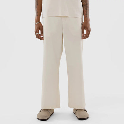 The model is wearing this MLB New York Yankees Chino Trousers in Cream. 1