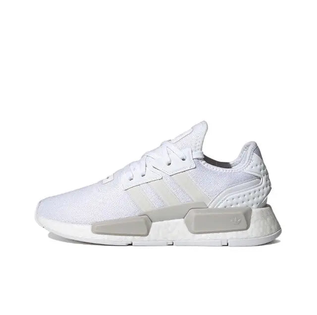 Adidas NMD_R1 low-top sneakers in white with three-bar stripes and gray sole