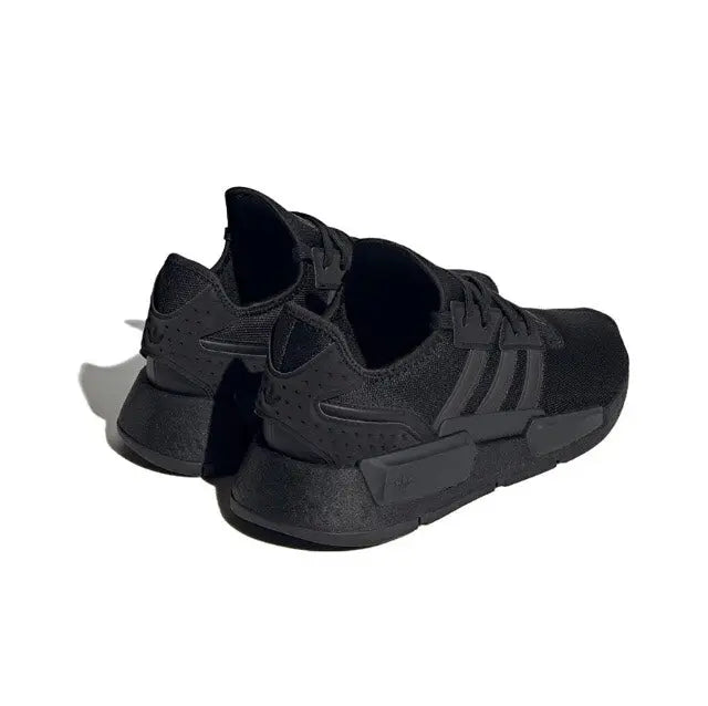 Low-top sneakers, black upper with thick midsole and treaded outsole