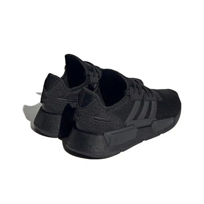 Low-top sneakers, black upper with thick midsole and treaded outsole