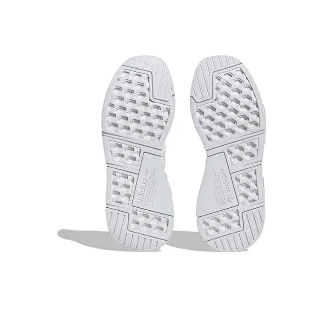 Adidas NMD_R1 outsole view, white rubber tread with traction pattern