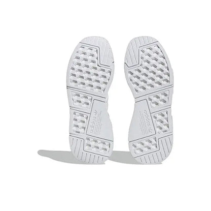 Adidas NMD_R1 outsole view, white rubber tread with traction pattern