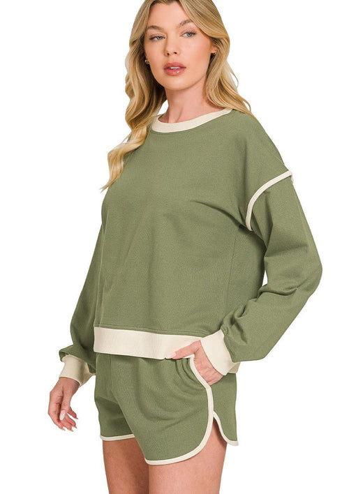 Olive cotton two-piece shorts set with long-sleeve crewneck top and cream-trim shorts