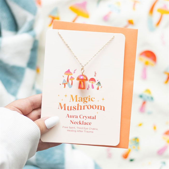 orange mushroom aura necklace greeting card styled in home setting with playful spiritual charm