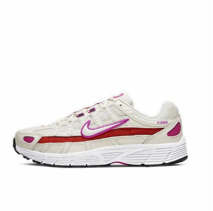 Beige/white running sneaker with purple swoosh, red stripe, and lace-up front