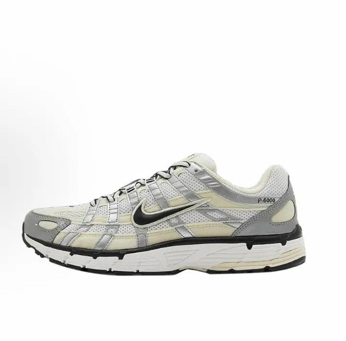 Nike P-6000 premium running sneaker in light gray, cream and black, side view