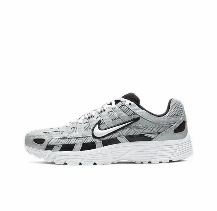 Gray and white Nike P-6000 running sneaker with black Swoosh