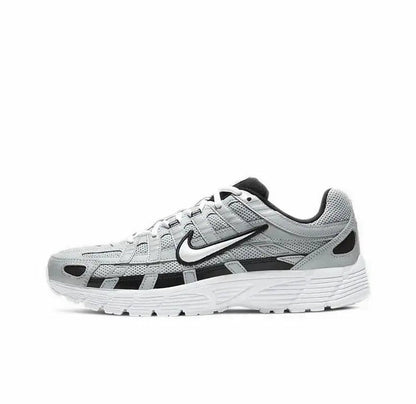 Gray and white Nike P-6000 running sneaker with black Swoosh
