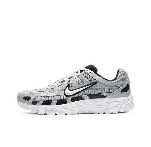 Gray and white Nike P-6000 running sneaker with black Swoosh