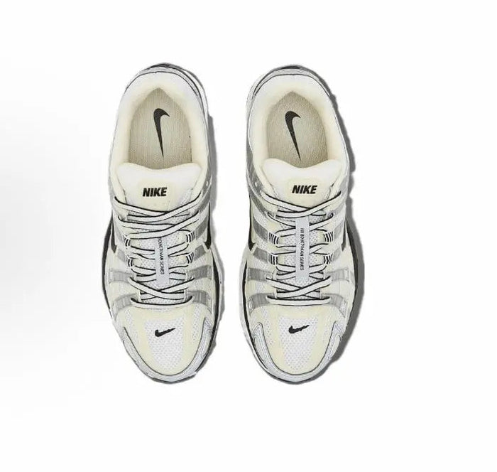 Nike P-6000 premium sneakers, light gray and cream with black swoosh, top view