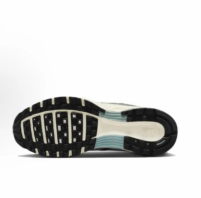 P-6000 Premium sneakers outsole view, dark rubber with white tread blocks
