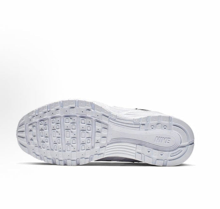 Light gray Nike sneakers outsole with rectangular tread pattern