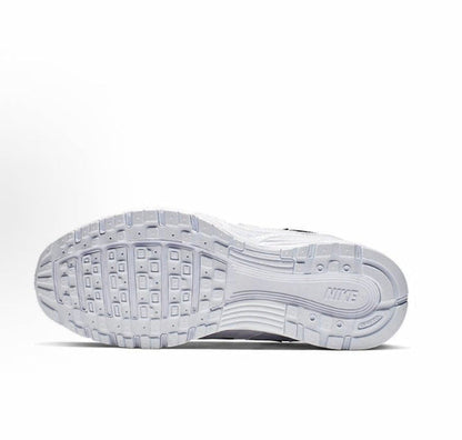 Light gray Nike sneakers outsole with rectangular tread pattern