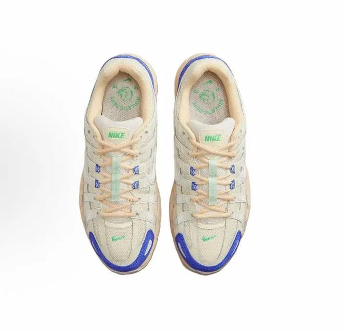 Nike P-6000 Premium sneakers, beige uppers with blue outsole edges and laces