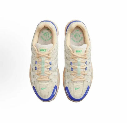 Nike P-6000 Premium sneakers, beige uppers with blue outsole edges and laces