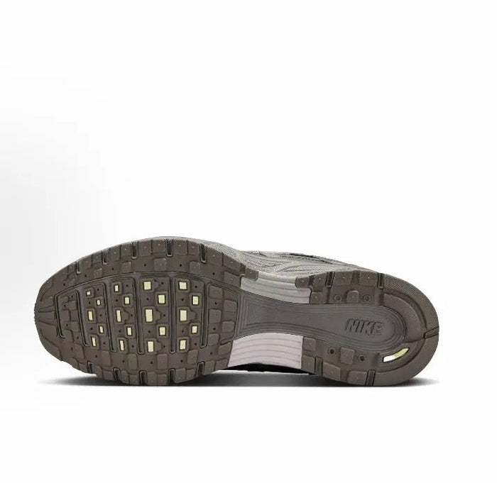 Nike P-6000 Premium outsole, grippy tread with NIKE logo on heel.