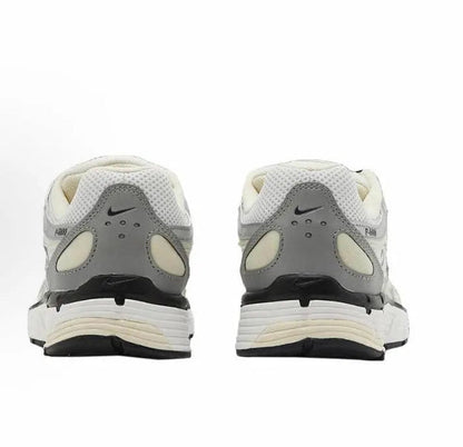 Nike P-6000 premium sneakers with heel tabs, light gray/cream and black details