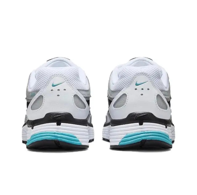 Nike P-6000 pair in white with teal stripe midsole and black heel tabs