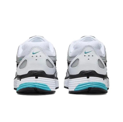 Nike P-6000 pair in white with teal stripe midsole and black heel tabs