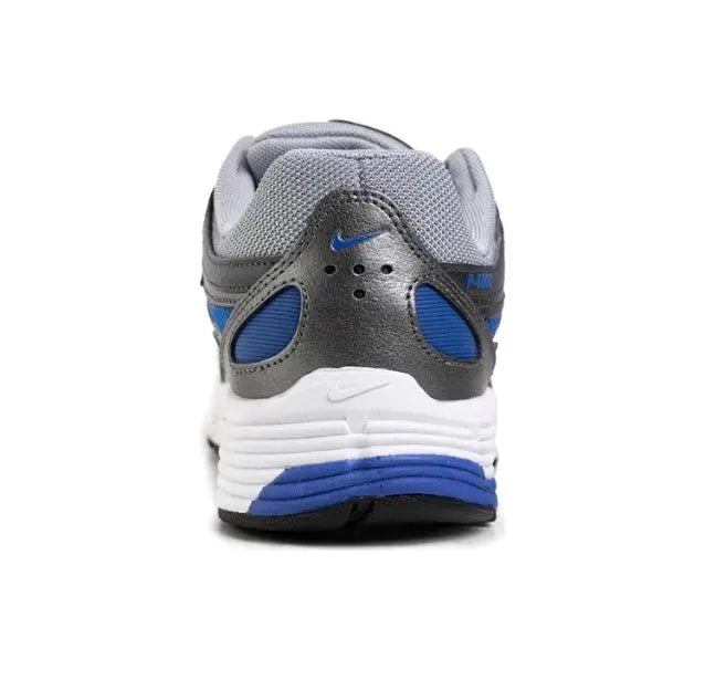 Running sneaker heel in gray with blue paneling and white foam sole