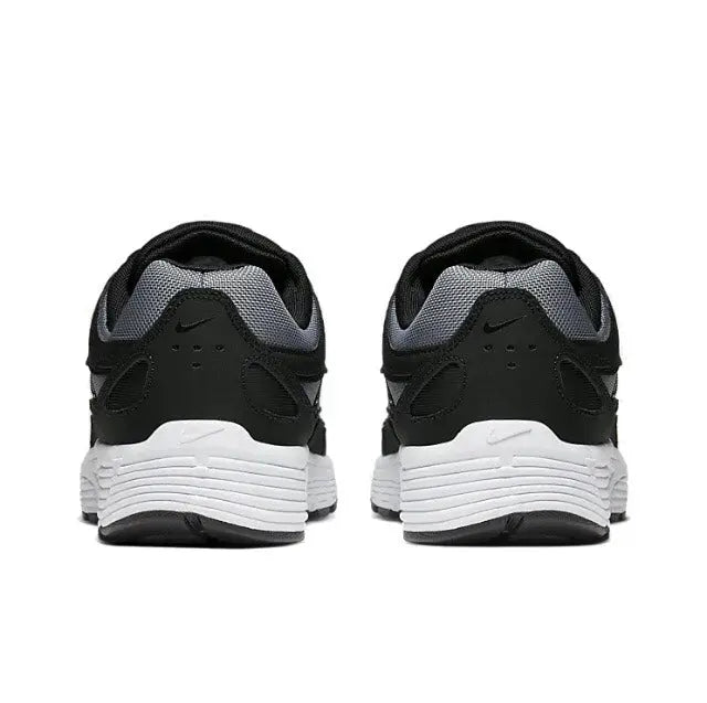 Nike P-6000 Premium sneaker heel view with black upper and white sole
