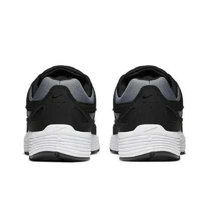 Nike P-6000 Premium sneaker heel view with black upper and white sole
