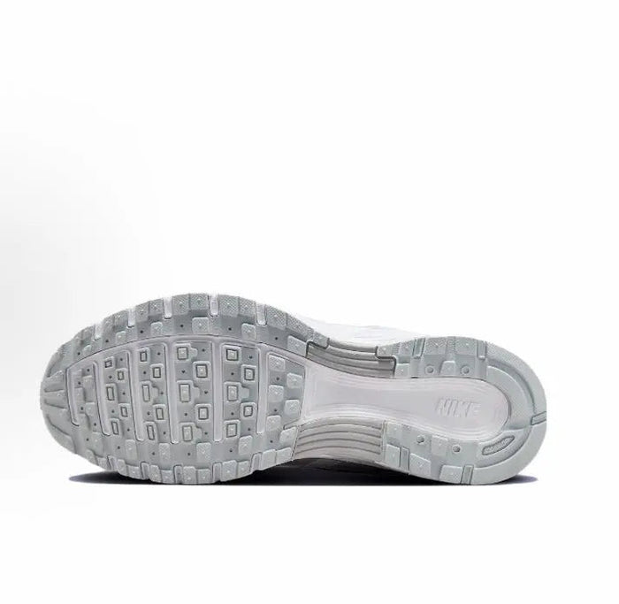 Nike P-6000 Premium sneakers with textured rubber outsole, underside view