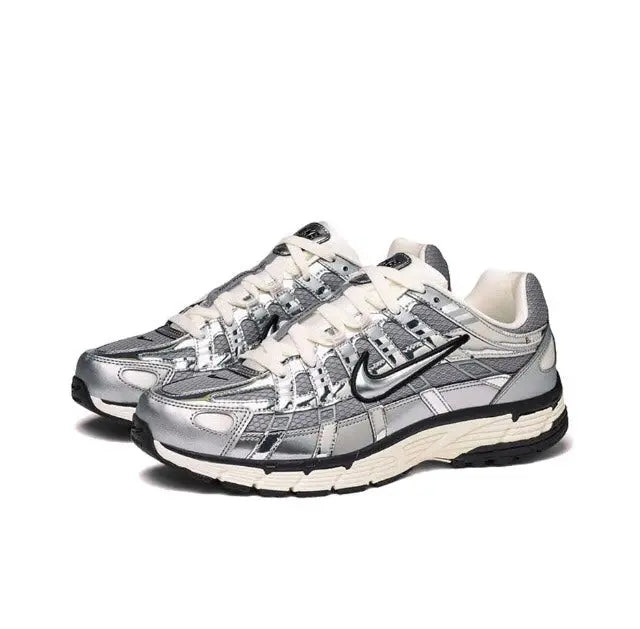 Nike P-6000 Premium sneakers, front three-quarter view in silver and black