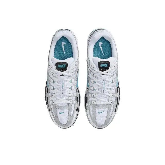 White Nike P-6000 shoes with teal Swoosh logos and lace eyelets