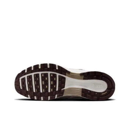 Nike P-6000 Premium sneakers outsole view, dark tread with light sole