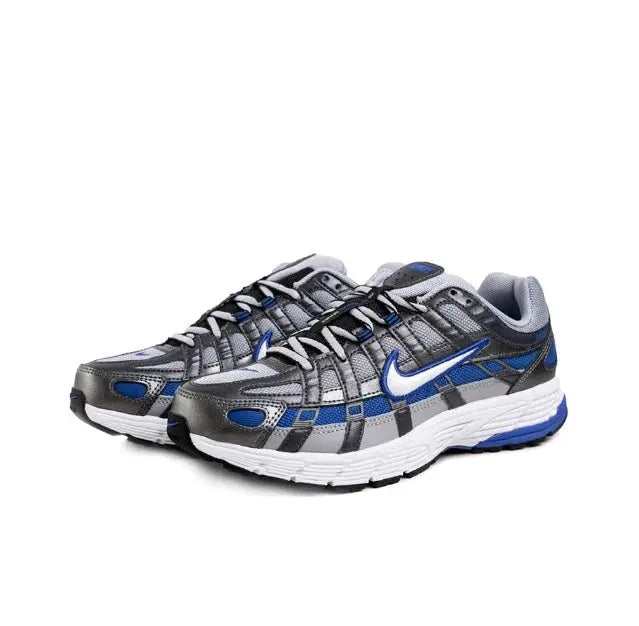 Running sneaker front-left view in gray with blue Nike swoosh and black straps