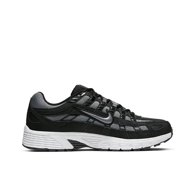 Nike P-6000 Premium sneaker side profile, black upper and white midsole