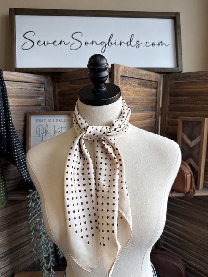 Polka dot wild rag scarf in ivory with dark dots, tied at the neck