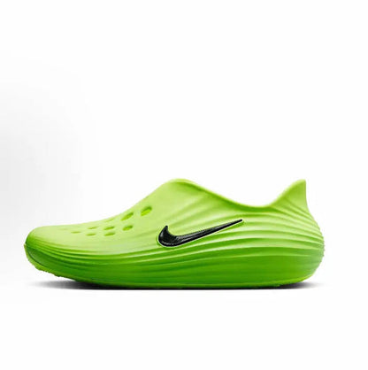 Green slip-on sneakers with black Swoosh and perforated upper, ridged sole
