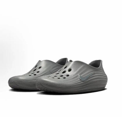 Grey slip-on clogs pair with perforated toe holes and curved ridges