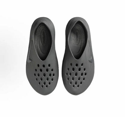 Grey clog pair with perforated upper and open heel openings