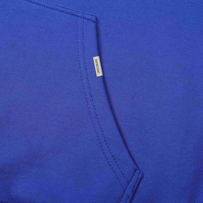 Blue hoodie fabric and inner pocket seam with small brand label tag