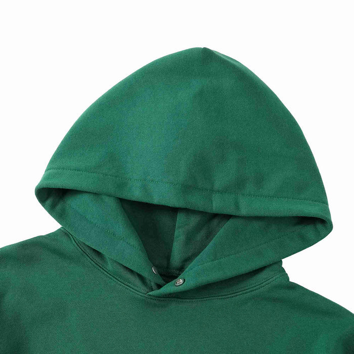 Green hoodie hood close-up with inner lining and front neckline seam