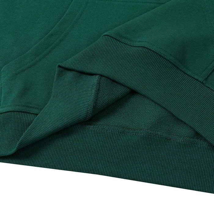 Green ribbed knit hoodie sleeve cuff and shoulder seam detail