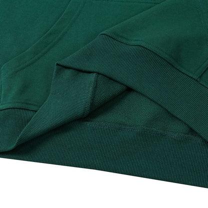 Green ribbed knit hoodie sleeve cuff and shoulder seam detail